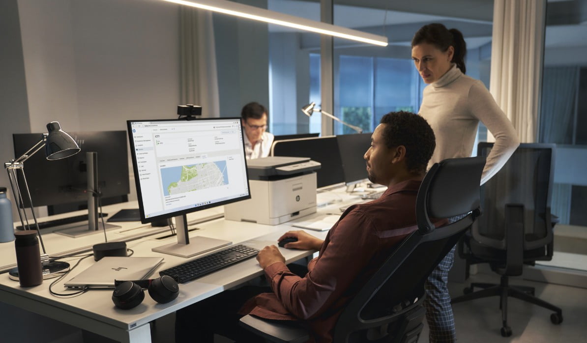 HP monitor, printer and laptop in a managed office environment